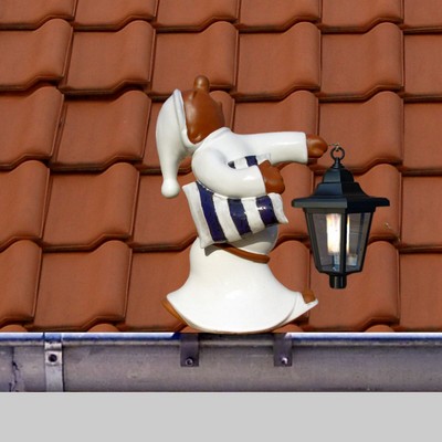 Schlafwandler mit Kissen und Laterne als Rinnenfigur